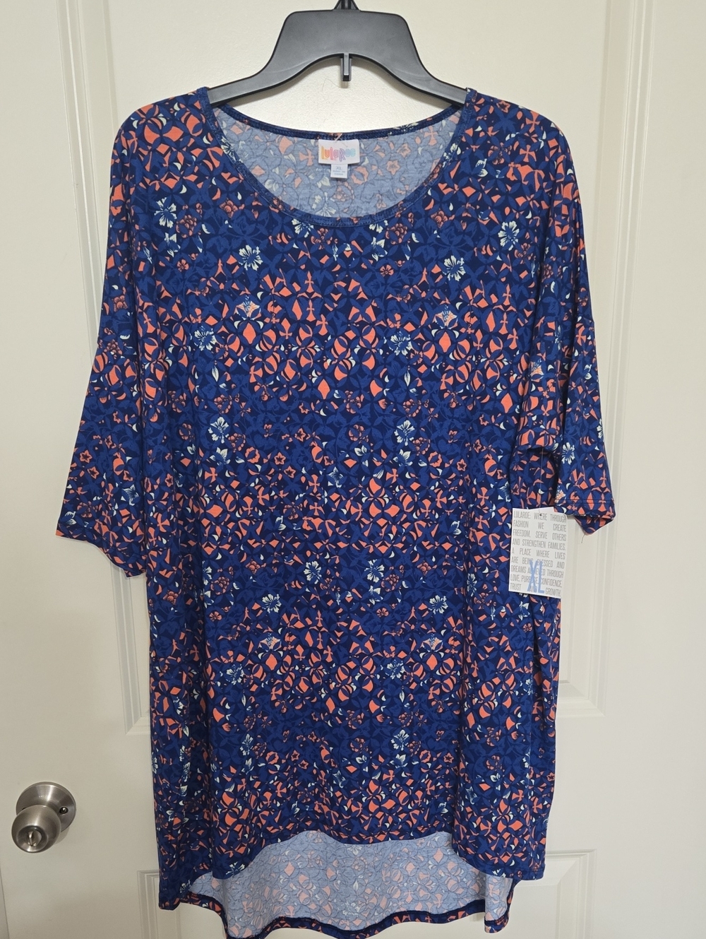 LuLaRoe Navy Tunic with Coral and Light Blue Floral Pattern